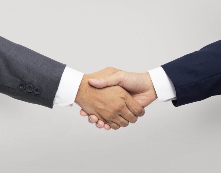 Business agreement handshake hand gesture